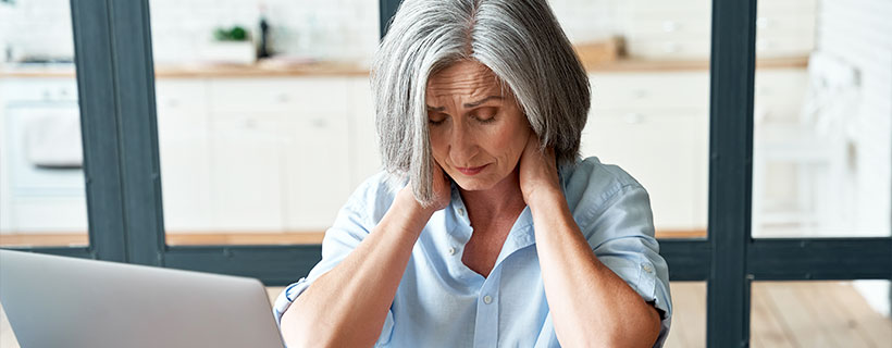 patient needing neck pain in need of Spinal Decompression Therapy in Raleigh